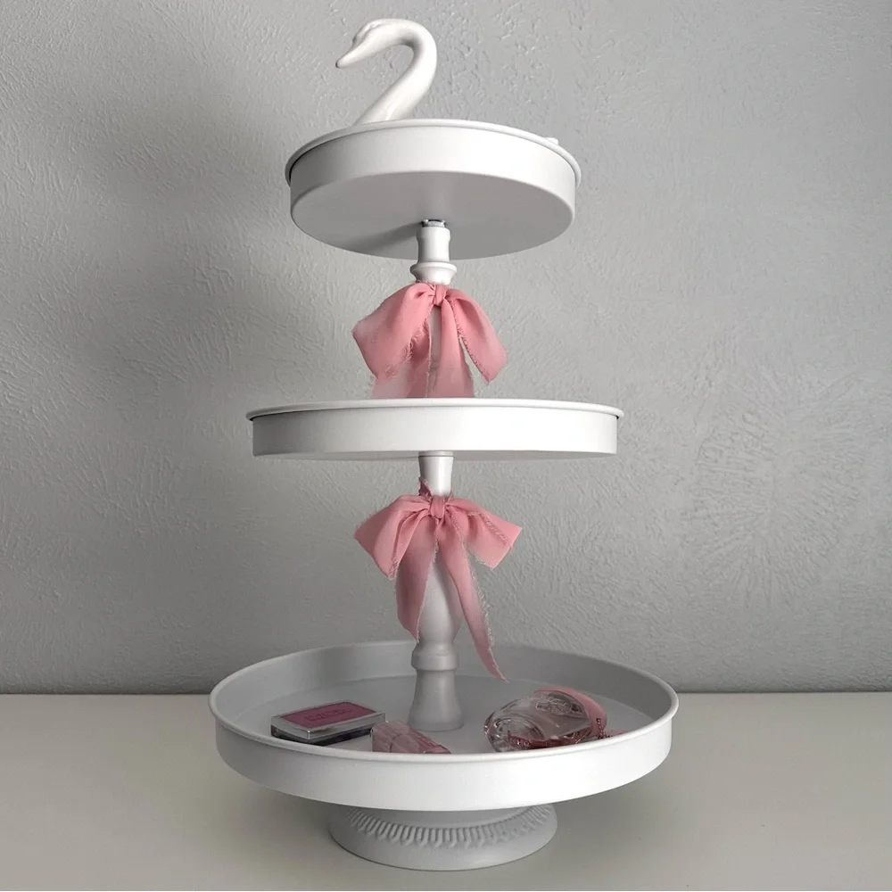 White Three-Tiered Stand with Pink Silk Bow Accents